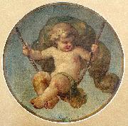Child sitting on swing